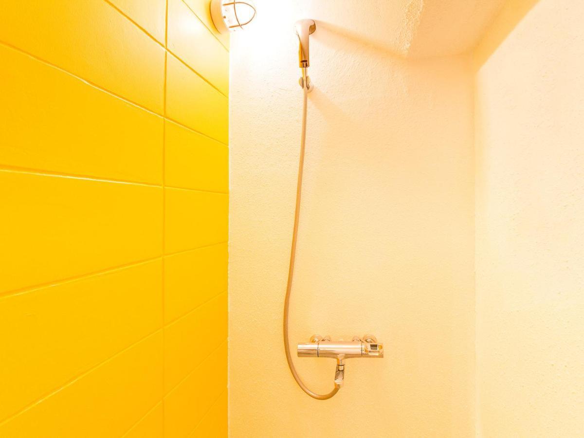 Seawall Hostel Chatan Bagian luar foto