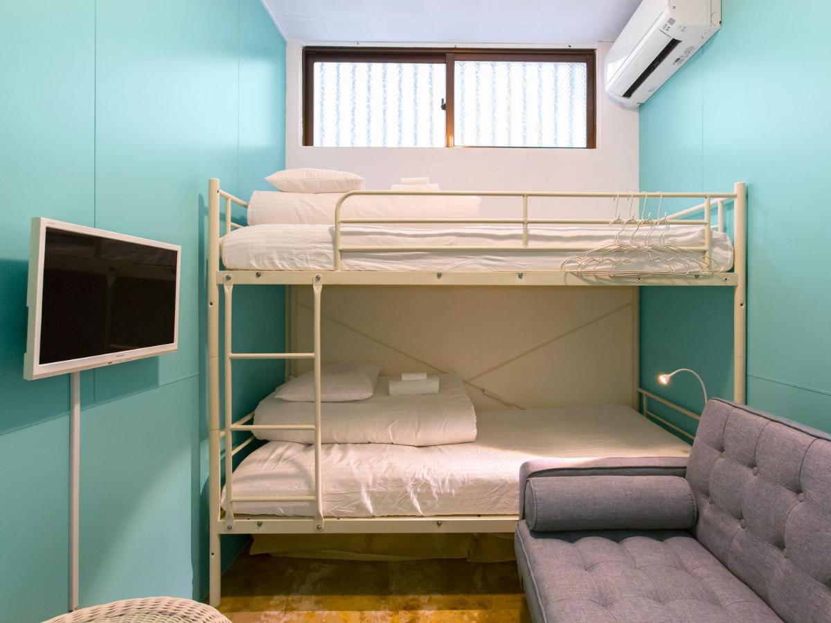 Seawall Hostel Chatan Bagian luar foto